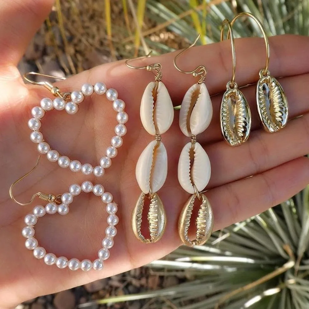 Hot Sale Elegant Golden Beach Shell Starfish Pearl Pearl Earrings Pendant Female Beach Boho Earring Set Gift Summer Jewelry
Hot Sale Elegant Golden Beach Shell Starfish Pearl Pearl Earrings Pendant Female Beach Boho Earring Set Gift Summer Jewelry