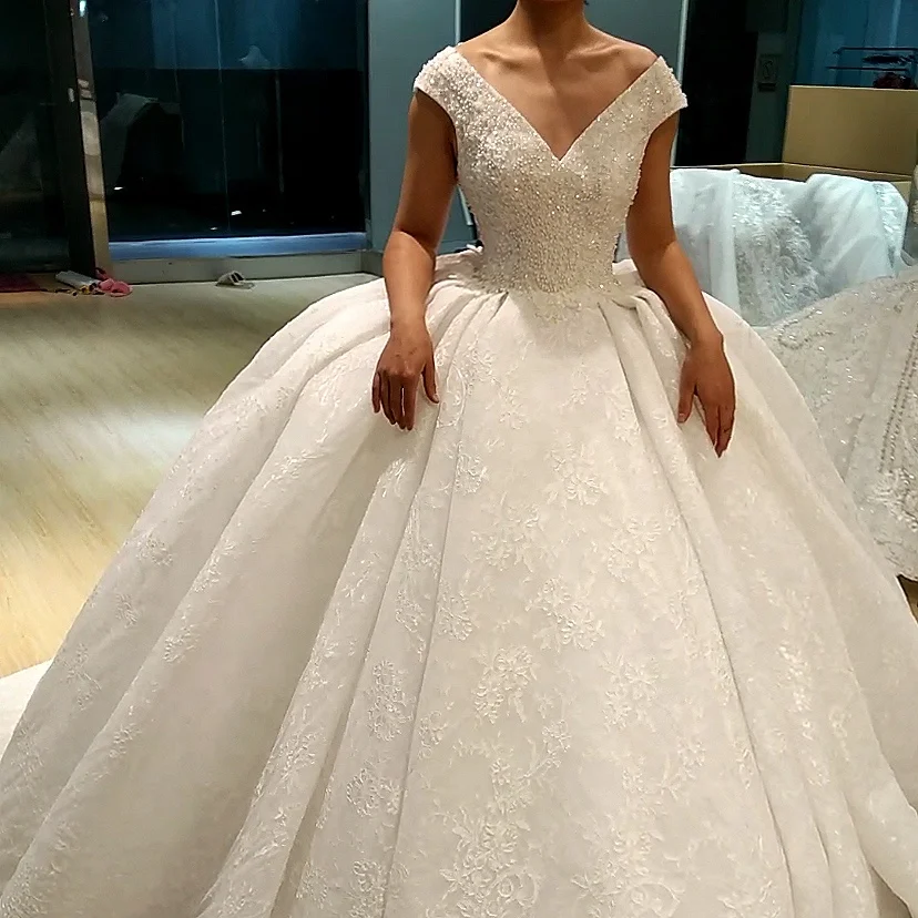 Marnham 2021 Fashion Elegant Luxury Wedding Dress Off The Shoulder Sequin Beaded Sexy Lace Sleeveless High Quality Bride Gown 
Marnham 2021 Fashion Elegant Luxury Wedding Dress Off The Shoulder Sequin Beaded Sexy Lace Sleeveless High Quality Bride Gown