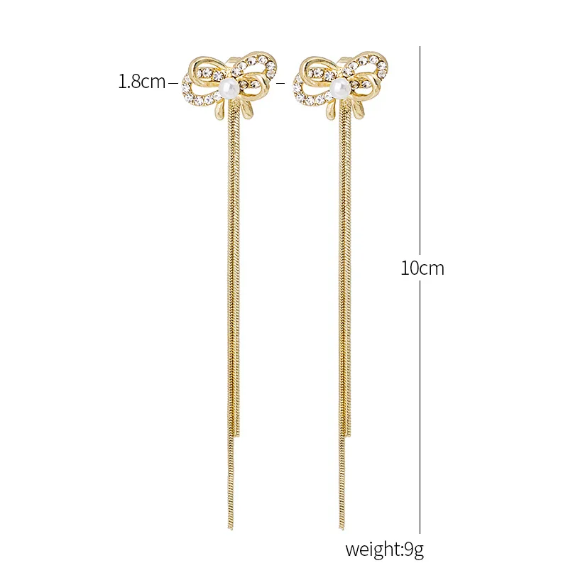 Delicate Rhinestone Bowknot Long Tassel Earrings for Women Gold Color Alloy Hollow Out Simulated-Pearl Drop Earrings Brincos
Delicate Rhinestone Bowknot Long Tassel Earrings for Women Gold Color Alloy Hollow Out Simulated-Pearl Drop Earrings Brincos
