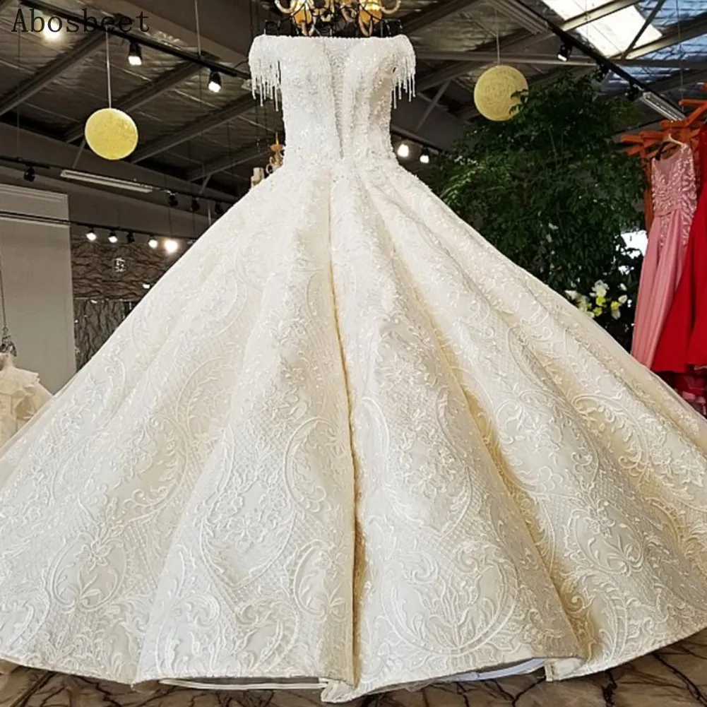 Luxury Embroidery Lace Wedding Dress Tassel Off Shoulder 2021 New Elegant Ball Gown Wedding Gown Bridal 100CM Train Shiny Beads
Luxury Embroidery Lace Wedding Dress Tassel Off Shoulder 2021 New Elegant Ball Gown Wedding Gown Bridal 100CM Train Shiny Beads