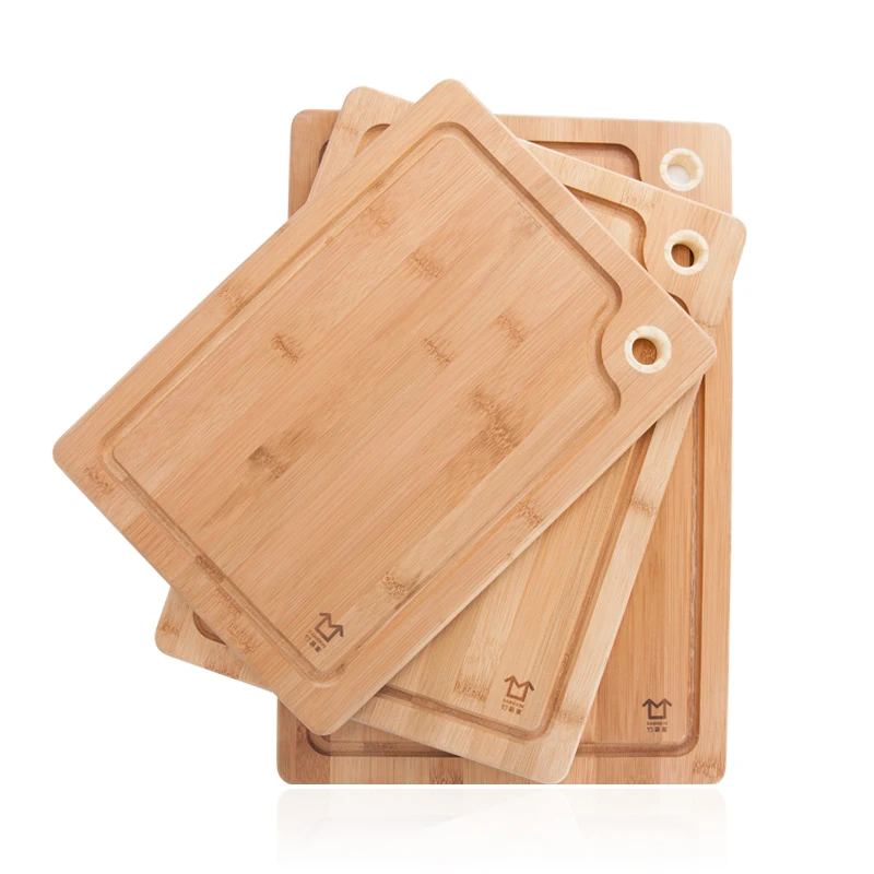 Bamboo wood cutting board with sink hanging hole chopping board thickening kitchen household fruit plate
Bamboo wood cutting board with sink hanging hole chopping board thickening kitchen household fruit plate
