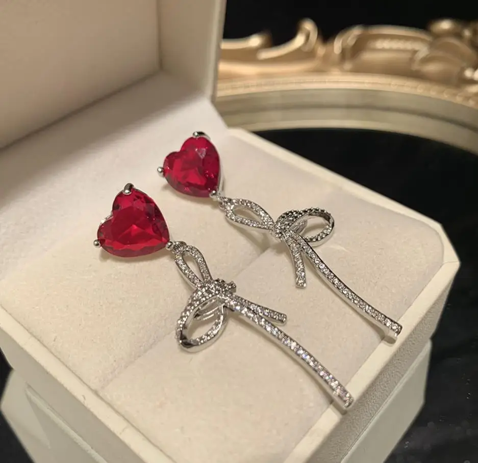 Red love New Year's elegant sweet long tassel bow earrings for girls romance Ribbon lovely lady lucky jewelry
Red love New Year's elegant sweet long tassel bow earrings for girls romance Ribbon lovely lady lucky jewelry