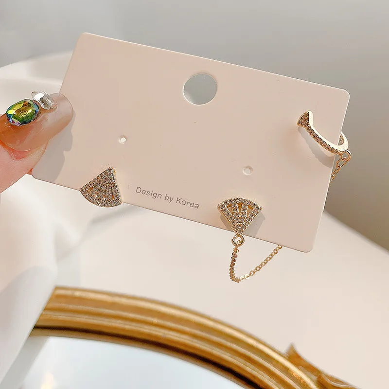 New hot seller simple fashion temperament high sense asymmetrical fan micro diamond tassel female earrings 
New hot seller simple fashion temperament high sense asymmetrical fan micro diamond tassel female earrings