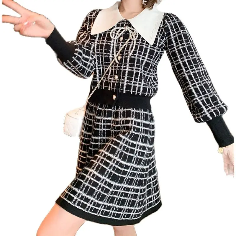 Повседневный Трикотажный костюм 2021 Осень/Зима Новый Стильный вязаный Топ с отворотом + юбка с высокой талией модная женская одежда из двух п...
Повседневный Трикотажный костюм 2021 Осень/Зима Новый Стильный вязаный Топ с отворотом + юбка с высокой талией модная женская одежда из двух п...