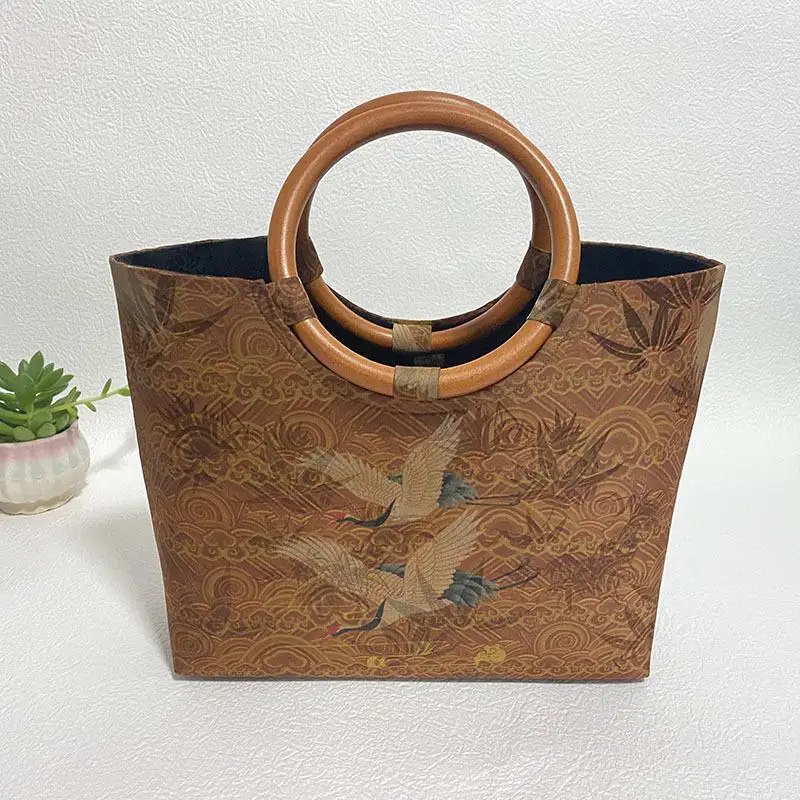2021 New Retro Fragrant Cloud Yarn Bag Crane Chinese Style Cheongsam Bag Middle-aged Mother Bag Handbag Gift
2021 New Retro Fragrant Cloud Yarn Bag Crane Chinese Style Cheongsam Bag Middle-aged Mother Bag Handbag Gift