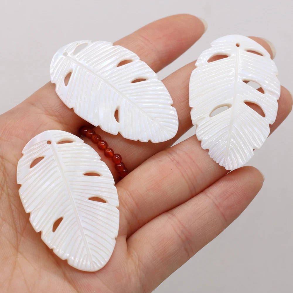 4pcs/pack Natural Freshwater Shell Leaf-shape Pendant Beads Craft For Jewelry Making DIY Necklace Earrings Charm Gift
4pcs/pack Natural Freshwater Shell Leaf-shape Pendant Beads Craft For Jewelry Making DIY Necklace Earrings Charm Gift