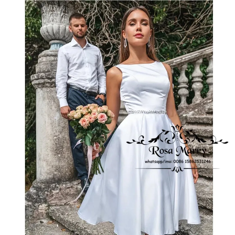 Шикарные короткие белые пляжные Vestido De Novia 2021 А-линия Иллюзия сзади по колено дешевые скромные свадебные платья в стиле бохо Кантри
Шикарные короткие белые пляжные Vestido De Novia 2021 А-линия Иллюзия сзади по колено дешевые скромные свадебные платья в стиле бохо Кантри