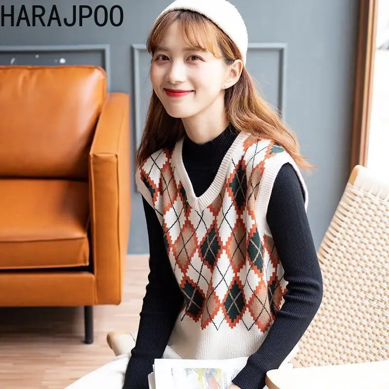Женский вязаный жилет Harajpoo в японском стиле колледжа осень 2021 корейский новый свитер со стразами и V-образным вырезом шерстяной Повседневны... 
Женский вязаный жилет Harajpoo в японском стиле колледжа осень 2021 корейский новый свитер со стразами и V-образным вырезом шерстяной Повседневны...