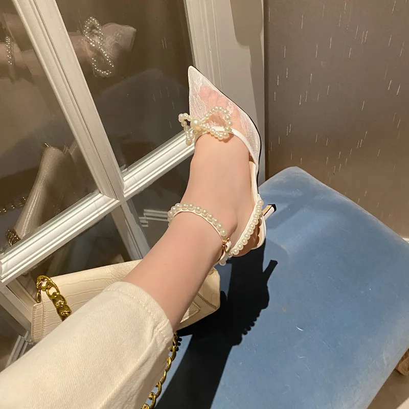 Summer sweet ladies pearl 7cm high heel sandals white high heels mesh sandals Cinderella wedding shoes
Summer sweet ladies pearl 7cm high heel sandals white high heels mesh sandals Cinderella wedding shoes