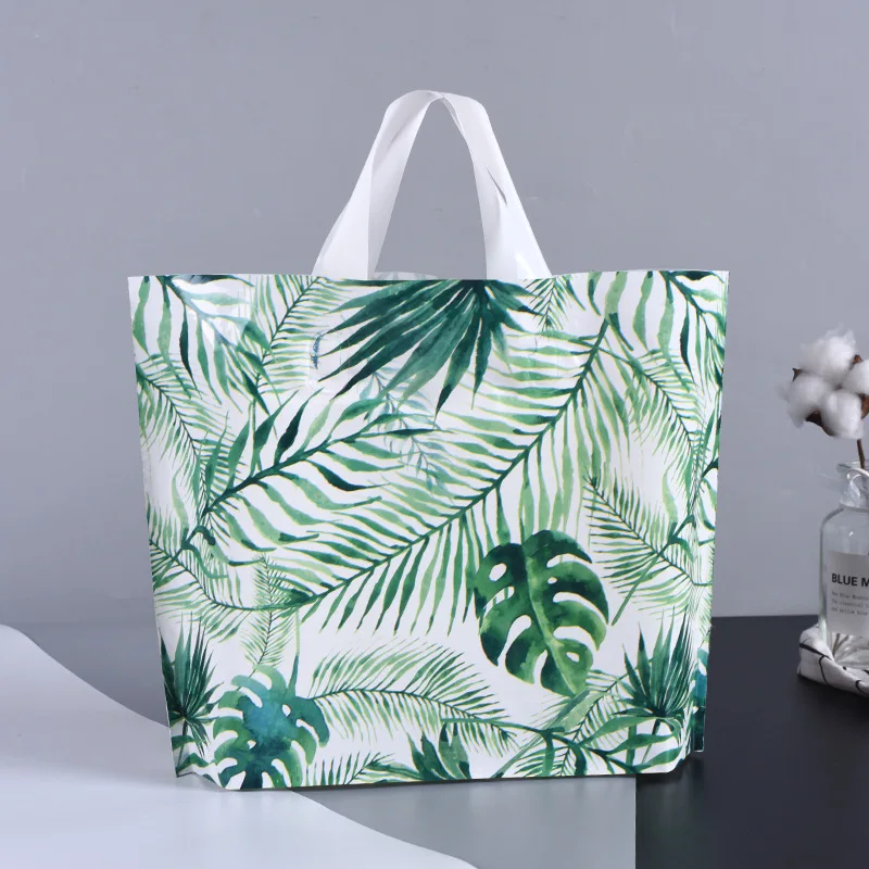 50pcs High Quality Plastic Shopping Bags Green Plant Clothing Package Bags Party Supply Christmas New Year Gift Bags With Handle
50pcs High Quality Plastic Shopping Bags Green Plant Clothing Package Bags Party Supply Christmas New Year Gift Bags With Handle