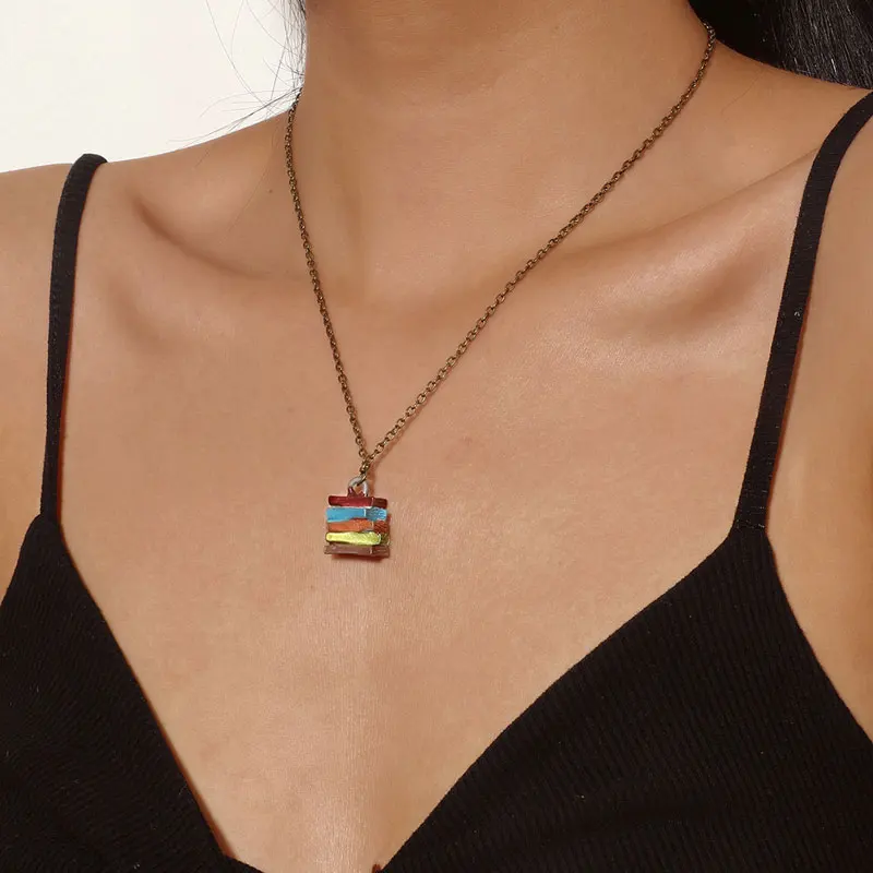 1pcs Stack of Books Pendant Necklace for Women Retro School Multicolor Library Lover Fashion Jewelry 
1pcs Stack of Books Pendant Necklace for Women Retro School Multicolor Library Lover Fashion Jewelry