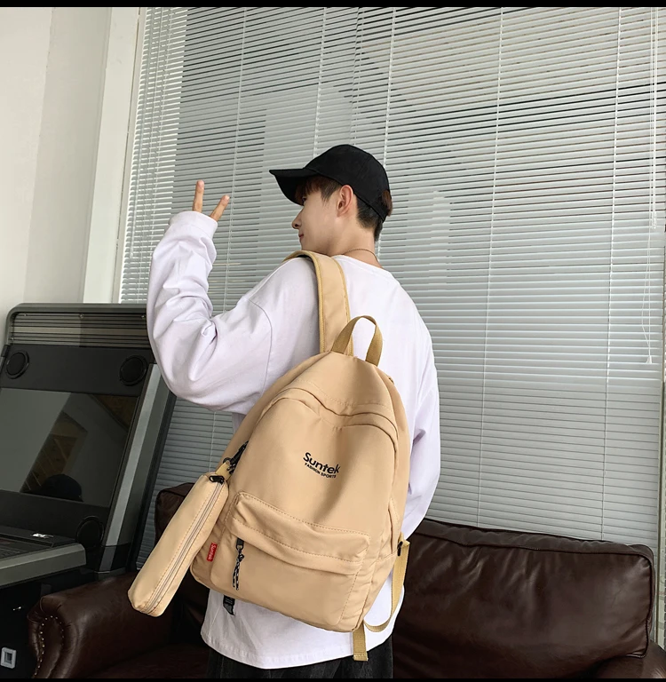 YJ1437 2021 new Japanese solid color high-value men' simple casual original niche campus female backpack
YJ1437 2021 new Japanese solid color high-value men' simple casual original niche campus female backpack