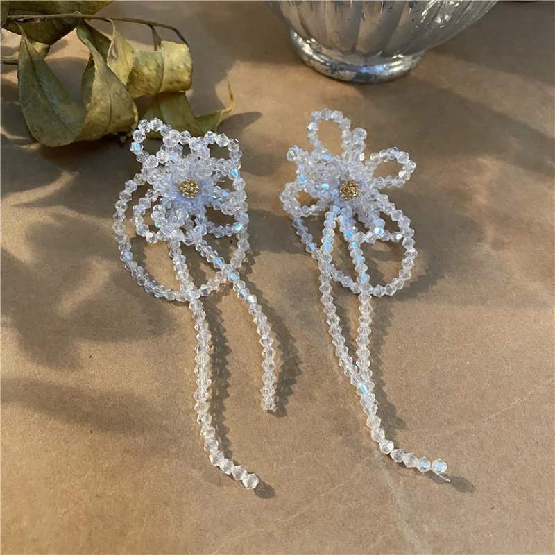 Korea internet celebrity The same sparkling flower crystal beaded sweet earrings super fairy style handmade ear accessories
Korea internet celebrity The same sparkling flower crystal beaded sweet earrings super fairy style handmade ear accessories