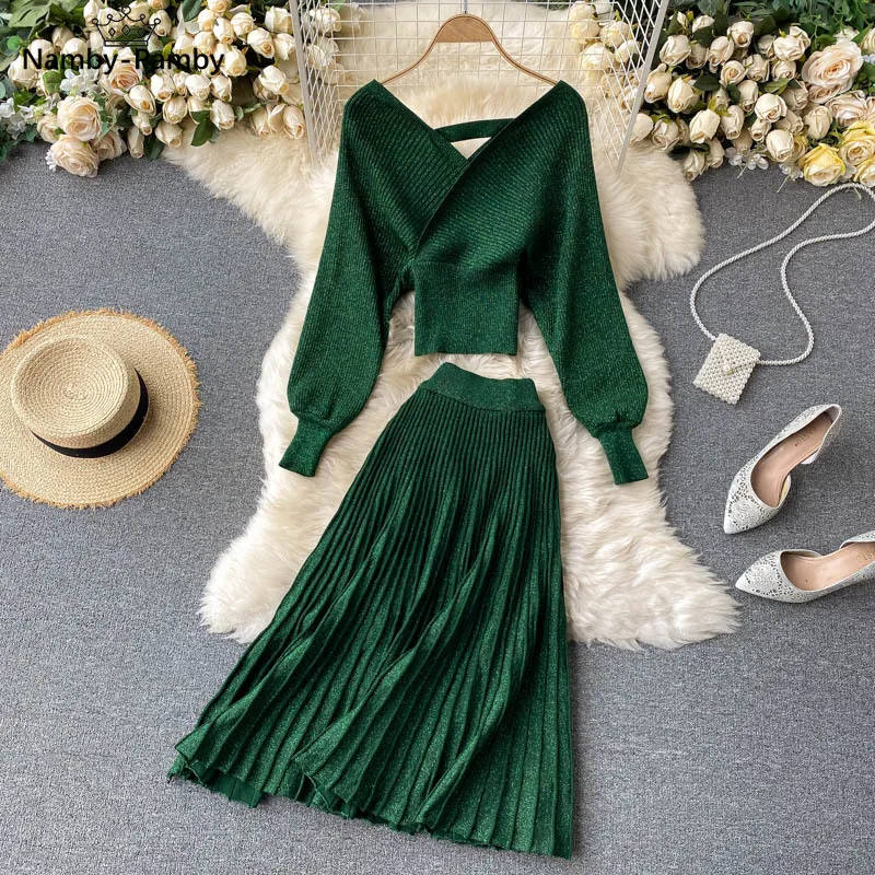 Women Korean New Style Cross V-neck Puff Sleeve Short Waist Top + Elastic High Waist Pleated Skirt Knitting Two Piece D039
Women Korean New Style Cross V-neck Puff Sleeve Short Waist Top + Elastic High Waist Pleated Skirt Knitting Two Piece D039