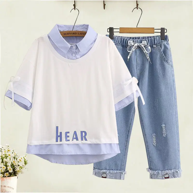 2021 Women Spring 2 Pcs Set Female Embroidery Cotton T-shirt + Calf-length Jeans Clothing Set Lady Mid Calf Denim Pant Suit G891
2021 Women Spring 2 Pcs Set Female Embroidery Cotton T-shirt + Calf-length Jeans Clothing Set Lady Mid Calf Denim Pant Suit G891