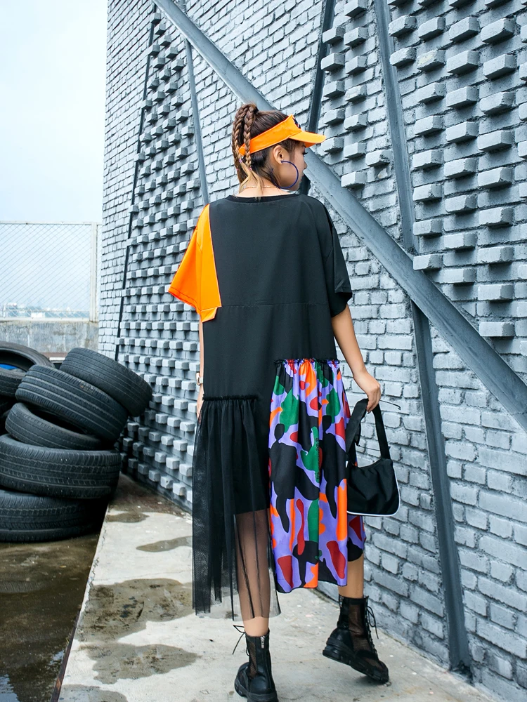 Fashionable tide brand design contrast color dress female summer printing asymmetric stitching large size mid-length cool dress
Fashionable tide brand design contrast color dress female summer printing asymmetric stitching large size mid-length cool dress