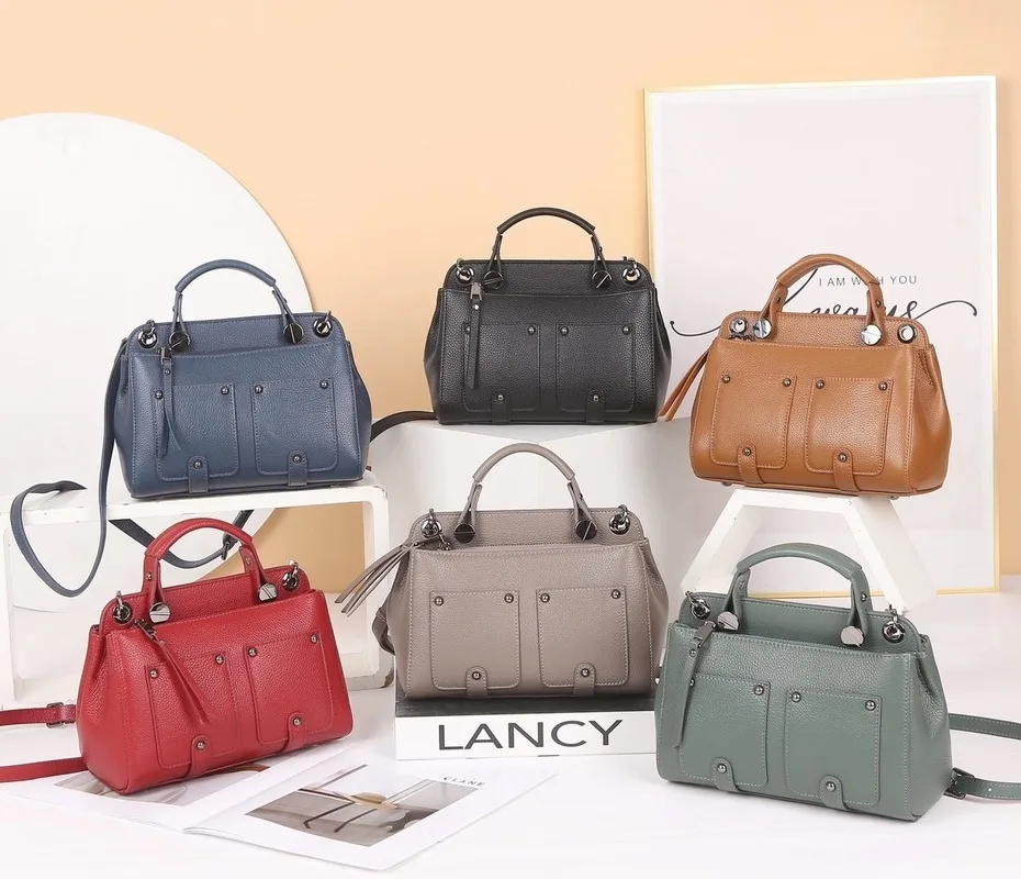 2020 autumn and winter new first layer cowhide rivet handbag large capacity double pocket single shoulder diagonal lady bag
2020 autumn and winter new first layer cowhide rivet handbag large capacity double pocket single shoulder diagonal lady bag