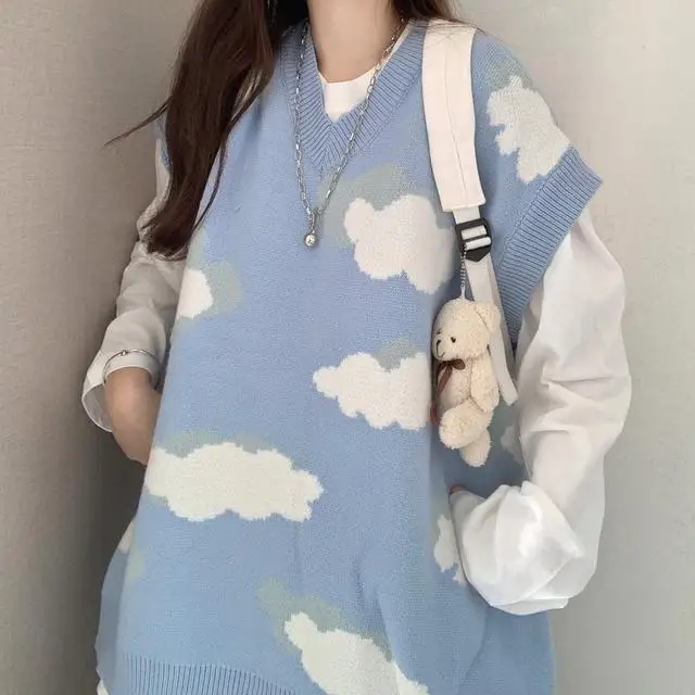 Two piece suit / one piece chic blue sky white cloud knitted sweater vest with long sleeve white T-shirt
Two piece suit / one piece chic blue sky white cloud knitted sweater vest with long sleeve white T-shirt