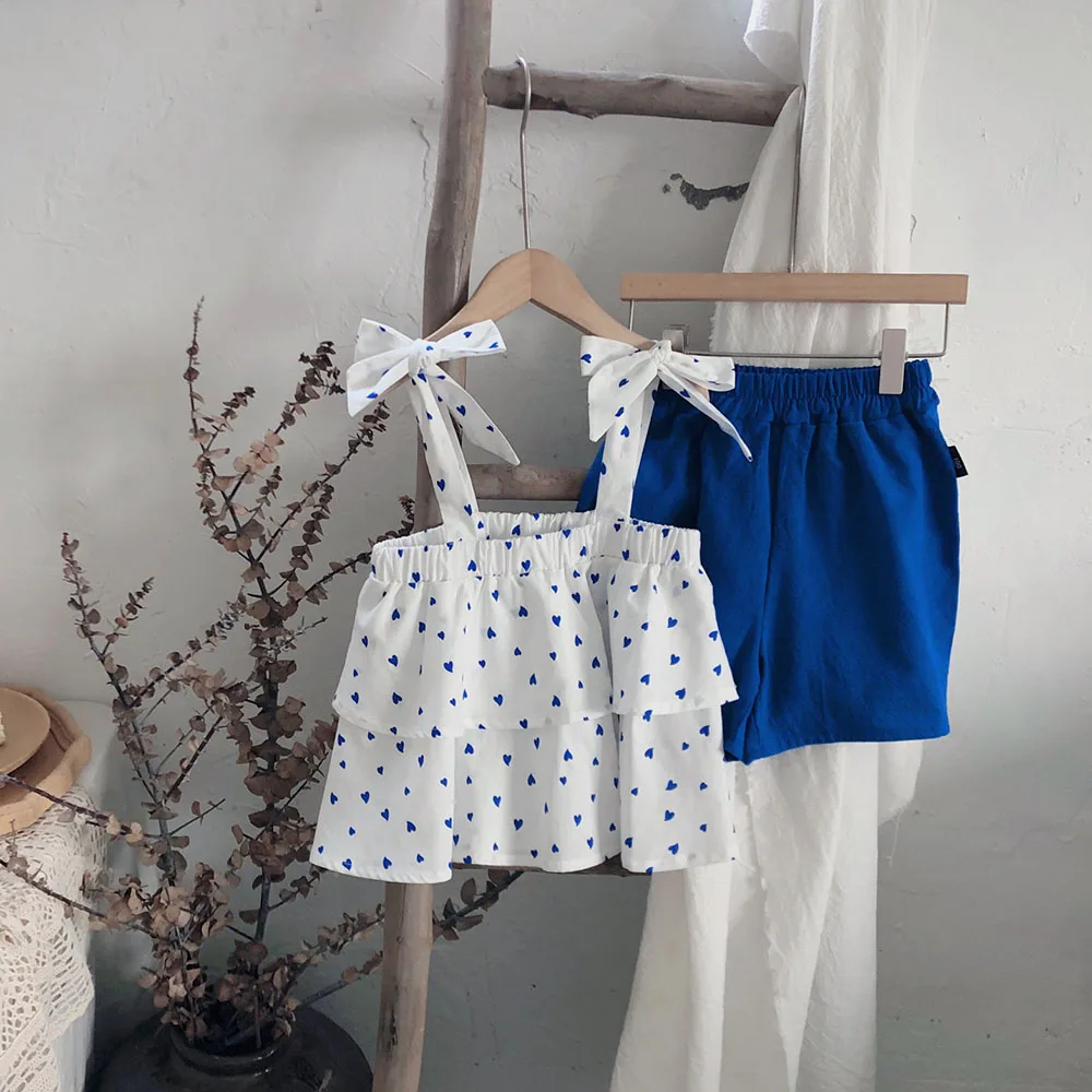 Hollead 2Pcs Girls Clothes Sets Bow Sling T-Shirt+Blue Short Pant Clothing Suit Heart Print Two-Layer Top Cute Girl Kids Clothes
Hollead 2Pcs Girls Clothes Sets Bow Sling T-Shirt+Blue Short Pant Clothing Suit Heart Print Two-Layer Top Cute Girl Kids Clothes