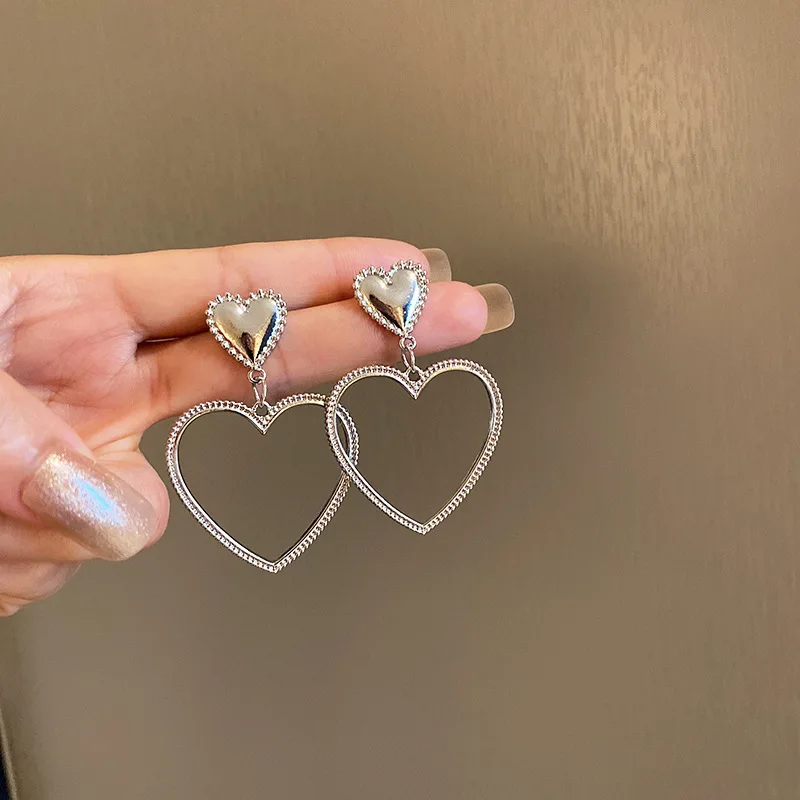 ZAYStars Simple Design Silver Color Hollow Heart Drop Earrings For Women New Brand Fashion Ear Cuff Piercing Dangle Earring Gift 
ZAYStars Simple Design Silver Color Hollow Heart Drop Earrings For Women New Brand Fashion Ear Cuff Piercing Dangle Earring Gift