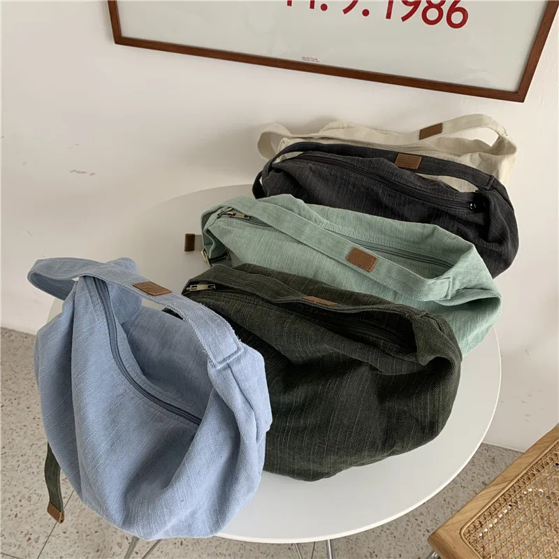 Bag women's 2021 new Japanese Korean shoulder diagonal jiaozi bag twill washed canvas to make old bags
Bag women's 2021 new Japanese Korean shoulder diagonal jiaozi bag twill washed canvas to make old bags