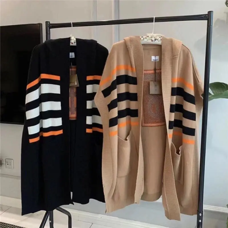 Women's 2021 early autumn new college style cardigan hooded autumn and winter casual loose wild striped sweater top
Women's 2021 early autumn new college style cardigan hooded autumn and winter casual loose wild striped sweater top