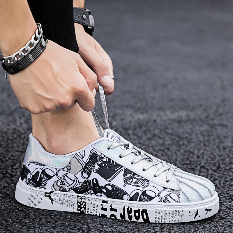 Men's sports shoes 2021 fashion breathable vulcanized shoes women's canvas graffiti flat shoes thick soled antiskid couple shoes 
Men's sports shoes 2021 fashion breathable vulcanized shoes women's canvas graffiti flat shoes thick soled antiskid couple shoes