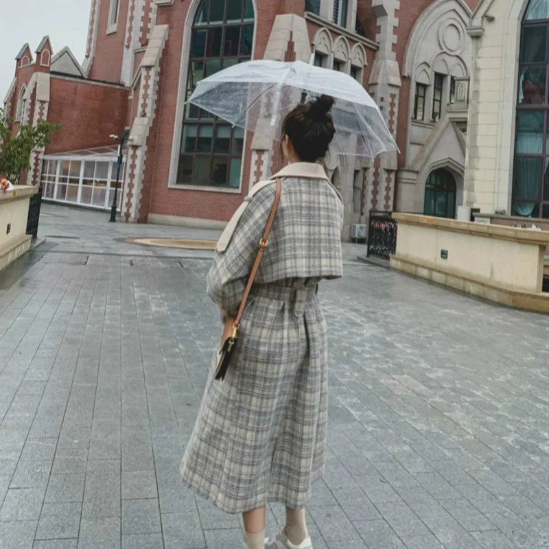 2020 Autumn Winter Long Woolen Coat Women Loose Casual Fashion Bandage Lapel High Quality Wool Blend Plaid Jacket Coats 
2020 Autumn Winter Long Woolen Coat Women Loose Casual Fashion Bandage Lapel High Quality Wool Blend Plaid Jacket Coats