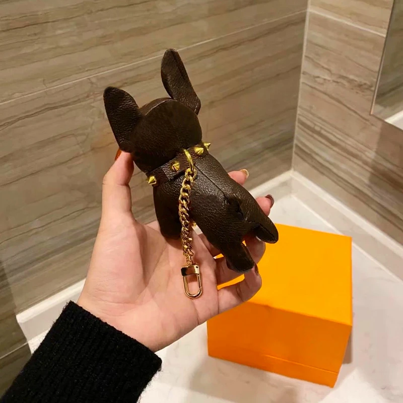 Luxury Good Luck Clover Flower Leather Bulldog Keychain Fashion Brands Key Chain Bag Charm Pendant Auto Accessories Keyring 2021
Luxury Good Luck Clover Flower Leather Bulldog Keychain Fashion Brands Key Chain Bag Charm Pendant Auto Accessories Keyring 2021