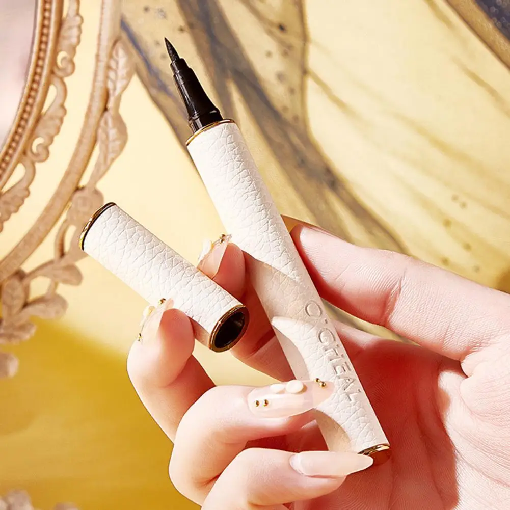 Black Liquid Eyeliner Artificial Sheepskin Shell Long-lasting Eye Make Up Stay All Day Liquid Eyeliner for Beauty
Black Liquid Eyeliner Artificial Sheepskin Shell Long-lasting Eye Make Up Stay All Day Liquid Eyeliner for Beauty