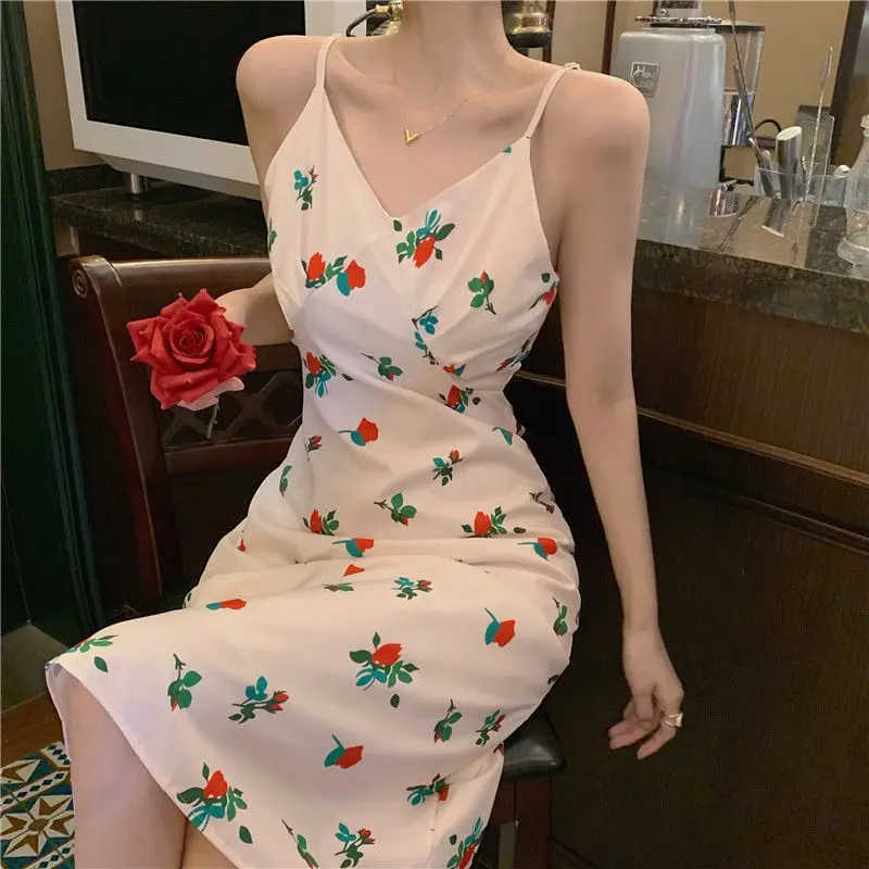 French retro women's new Print Chiffon Dress V-neck open back slim suspender skirt
French retro women's new Print Chiffon Dress V-neck open back slim suspender skirt