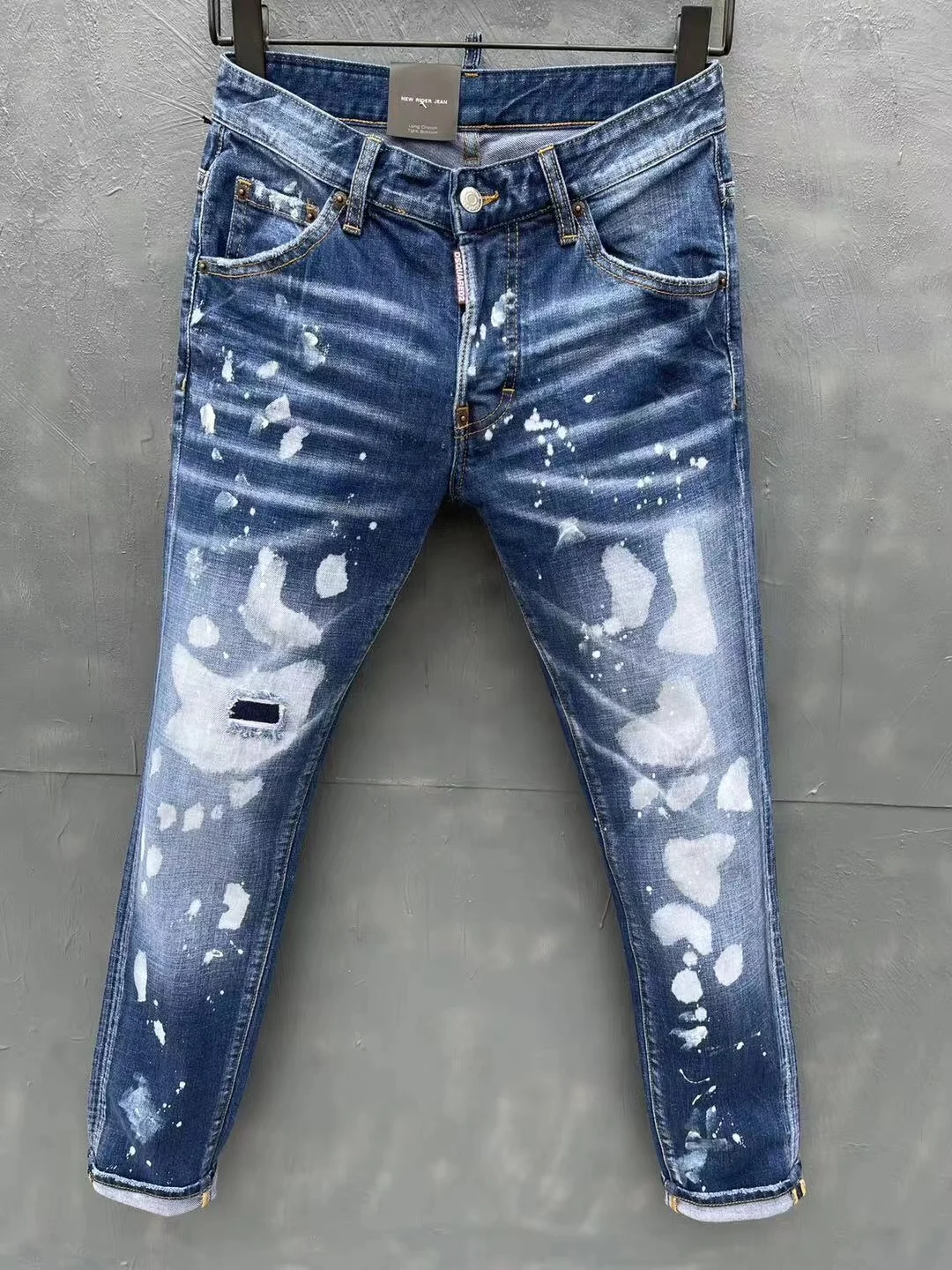 Men's Skinny New DSQ2 Jeans With Ripped Holes D2 elastic Paint Spray Blue Stitching Beggar Pants
Men's Skinny New DSQ2 Jeans With Ripped Holes D2 elastic Paint Spray Blue Stitching Beggar Pants