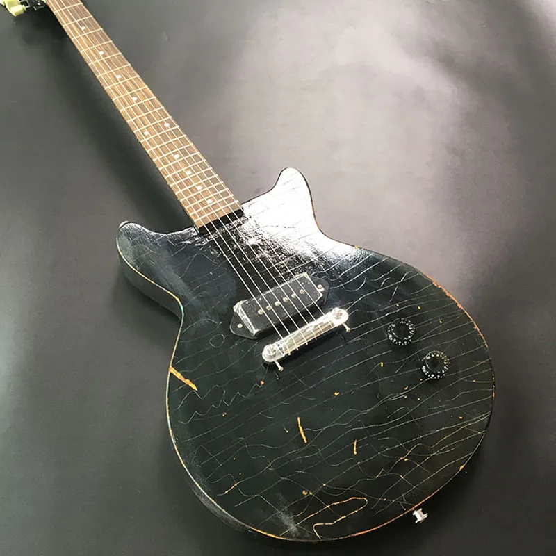 Relic LP Electric guitar Mahogany Body Maple Neck Aged Hardware Black Color Nitro Finish
Relic LP Electric guitar Mahogany Body Maple Neck Aged Hardware Black Color Nitro Finish