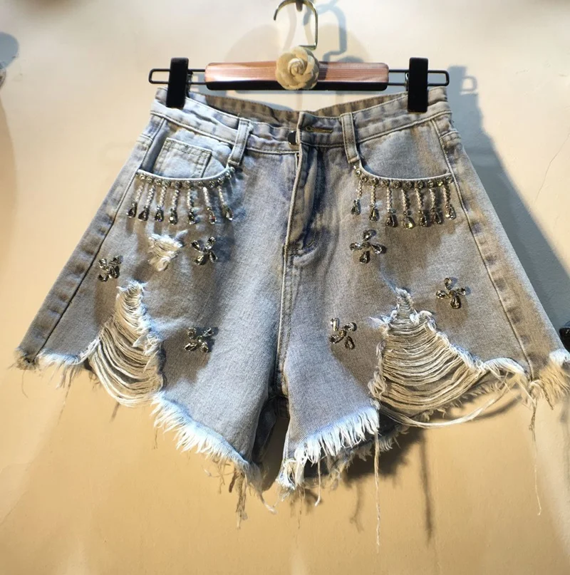Women Denim Shorts 2021 Summer New Exquisite Rhinestone Beaded High Waist Slimming Brushed Ripped Jeans Loose Wide Leg Pants
Women Denim Shorts 2021 Summer New Exquisite Rhinestone Beaded High Waist Slimming Brushed Ripped Jeans Loose Wide Leg Pants