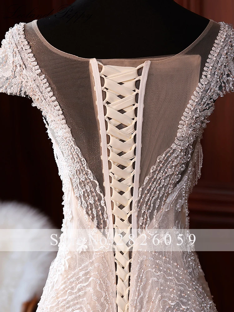 Lceland Poppy Luxury Mermaid Wedding Dresses 2020 Scoop Neck Beaded Short Sleeves Floor Length Lace Appliques Bridal Gowns
Lceland Poppy Luxury Mermaid Wedding Dresses 2020 Scoop Neck Beaded Short Sleeves Floor Length Lace Appliques Bridal Gowns