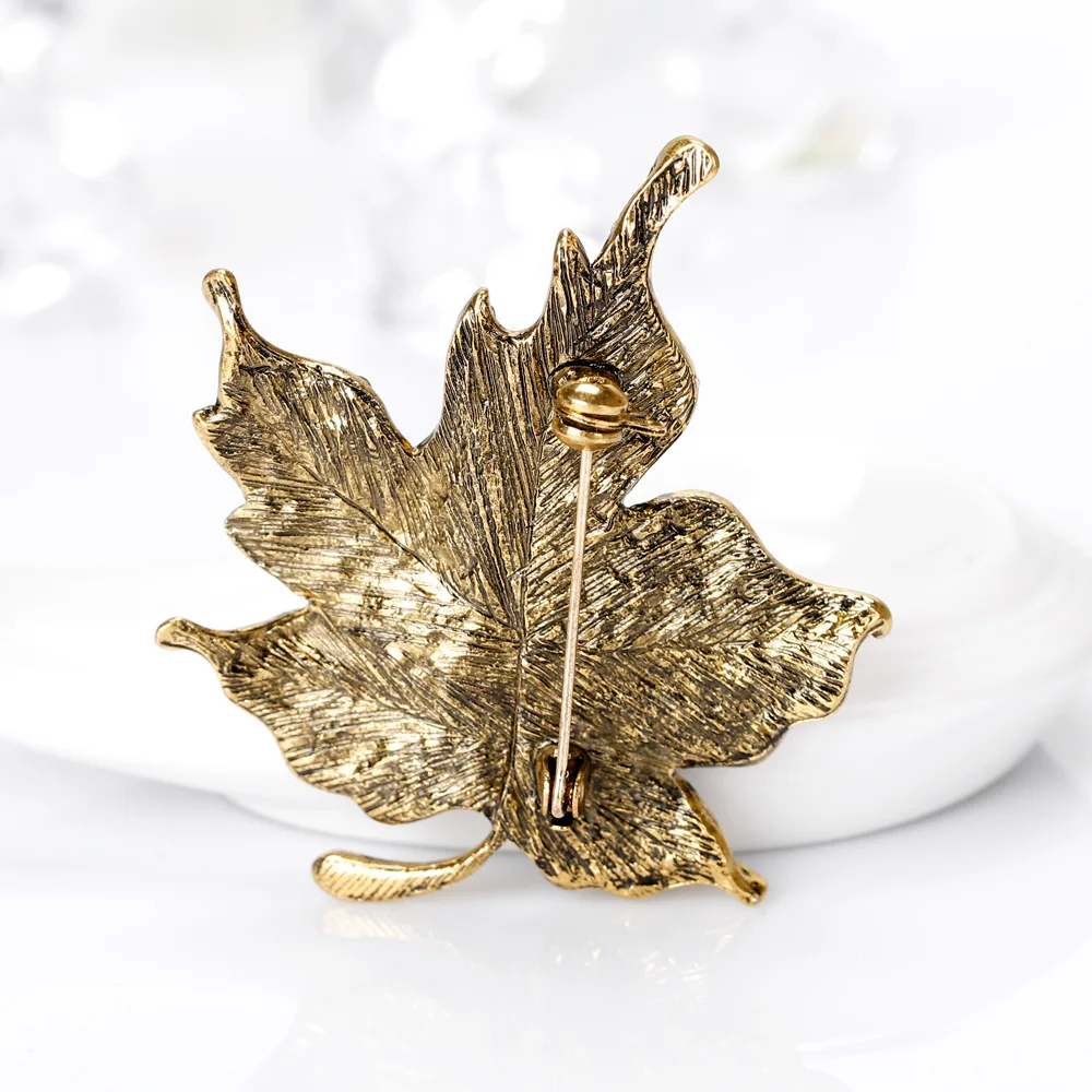 Fashion New Sweater Brooch Colorful Maple Leaf Shaped Brooch Pins Clothes For Women Wedding Rhinestone Leaves Pins
Fashion New Sweater Brooch Colorful Maple Leaf Shaped Brooch Pins Clothes For Women Wedding Rhinestone Leaves Pins