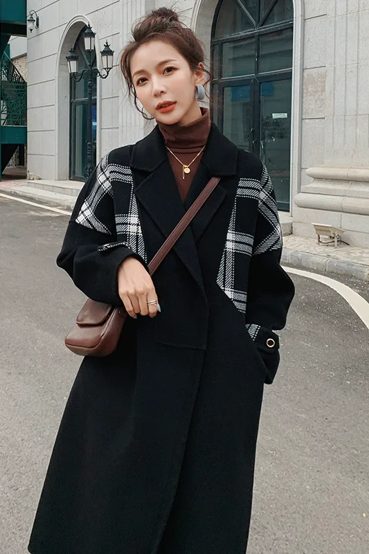 Hepburn style sleeves stitching black woolen coat women's mid-length autumn and winter new thick casual woolen coat
Hepburn style sleeves stitching black woolen coat women's mid-length autumn and winter new thick casual woolen coat