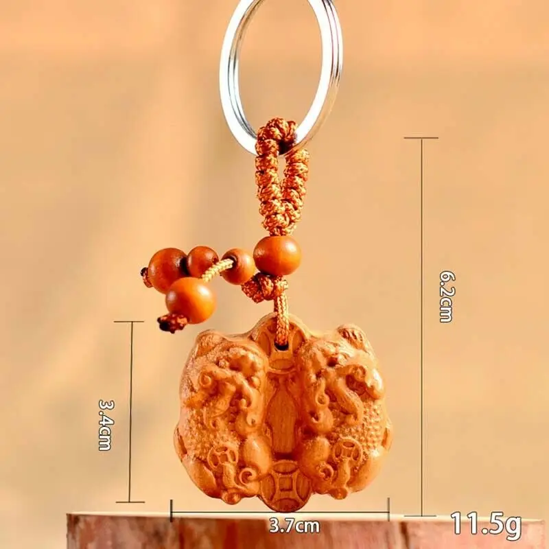 Chinese Feng Shui Geomancy Wealth Pixiu Piyao Wood Carving Statue Key Ring Pendant
Chinese Feng Shui Geomancy Wealth Pixiu Piyao Wood Carving Statue Key Ring Pendant