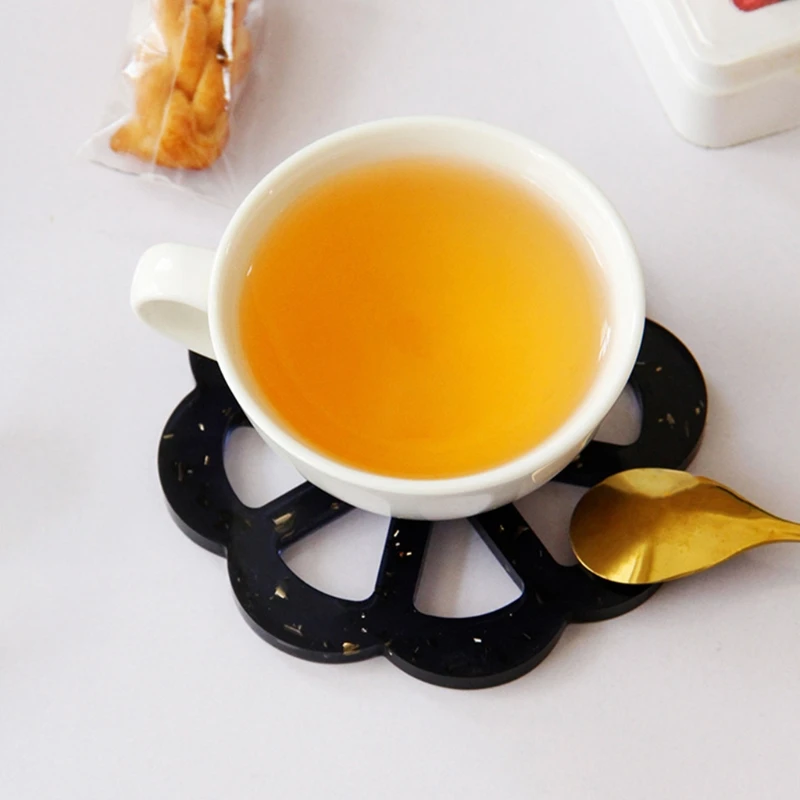 Cup Coasters European Style Creative Cup Coaster Simple Black Hollow Flower-shaped Resin Coaster Cup Pads for Home Table
Cup Coasters European Style Creative Cup Coaster Simple Black Hollow Flower-shaped Resin Coaster Cup Pads for Home Table
