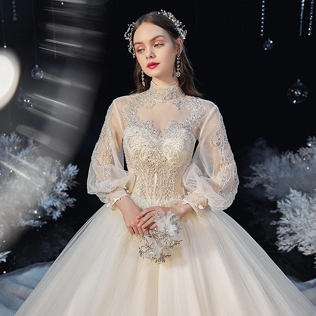 Luxury Princess Wedding Dress Long Sleeve High Neck Shiny Beaded Pearl Crystal Lace Illusion Wedding Bridal Gown With Train 2022
Luxury Princess Wedding Dress Long Sleeve High Neck Shiny Beaded Pearl Crystal Lace Illusion Wedding Bridal Gown With Train 2022
