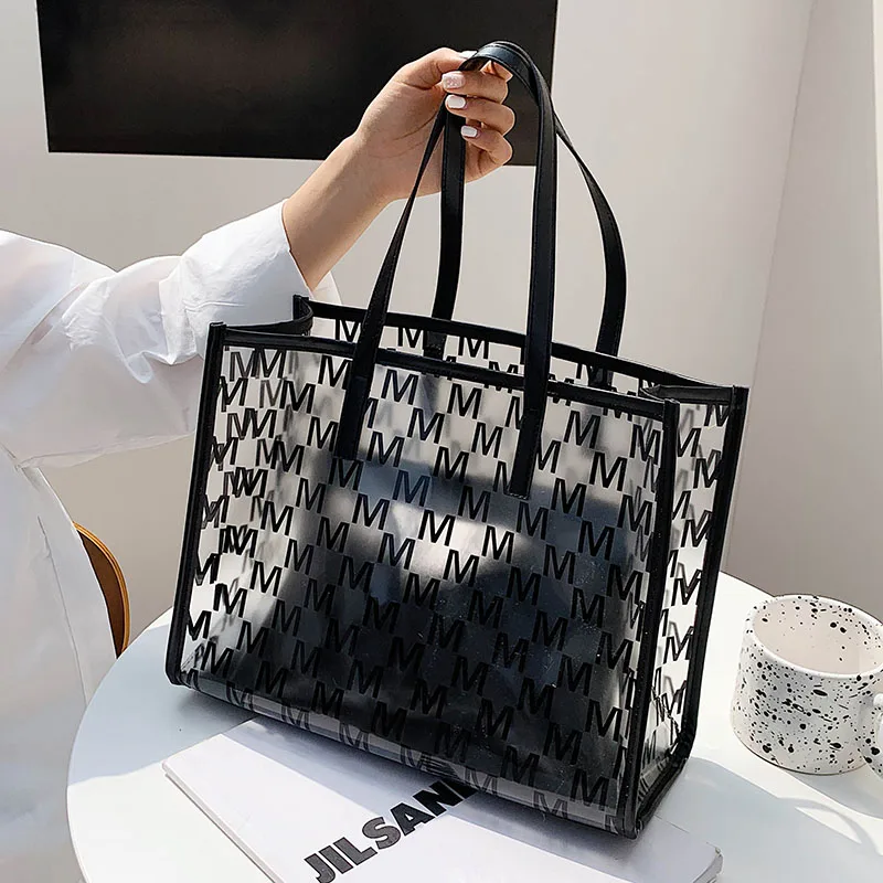 Large Capacity Shoulder Handbag 2021 New High Quality Transparent Shoulder Bag Print Letter Tote Bag 
Large Capacity Shoulder Handbag 2021 New High Quality Transparent Shoulder Bag Print Letter Tote Bag