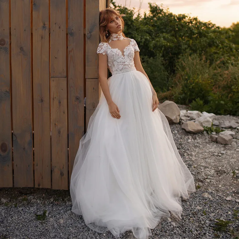 KapokDressy Charming High-neck Short Sleeve Wedding Dresses 2021 Sweep Train Lace Applique Tulle A-line Bridal Gowns
KapokDressy Charming High-neck Short Sleeve Wedding Dresses 2021 Sweep Train Lace Applique Tulle A-line Bridal Gowns