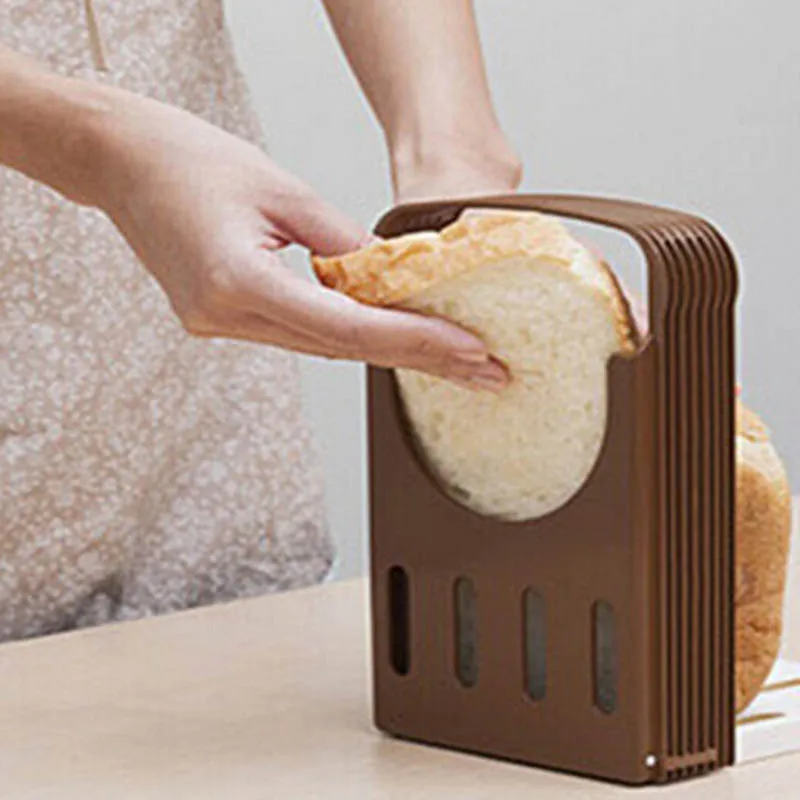 Toast Bread Slicer Plastic Foldable Loaf Cutter Rack Cutting Guide Slicing Tools Kitchen Accessories Gadgets Baking Accessories
Toast Bread Slicer Plastic Foldable Loaf Cutter Rack Cutting Guide Slicing Tools Kitchen Accessories Gadgets Baking Accessories