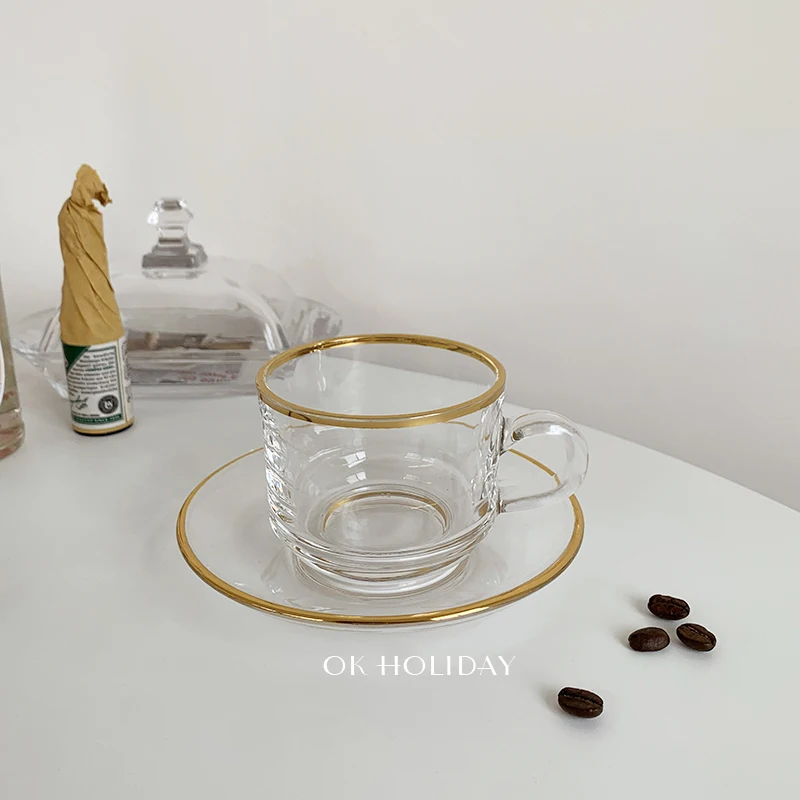 Nordic Creative Luxury Cup Glass Transparent Gold Rim with Saucer Set Cup Tazas Cafe Drinkware Breakfast Milk Tea Cups Office
Nordic Creative Luxury Cup Glass Transparent Gold Rim with Saucer Set Cup Tazas Cafe Drinkware Breakfast Milk Tea Cups Office