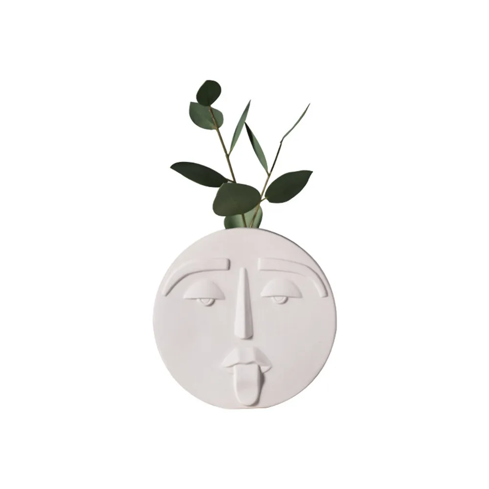 Nordic Modern Handicraft Decoration Living Room Artist Home Decoration Creative Ceramic Face Vase
Nordic Modern Handicraft Decoration Living Room Artist Home Decoration Creative Ceramic Face Vase