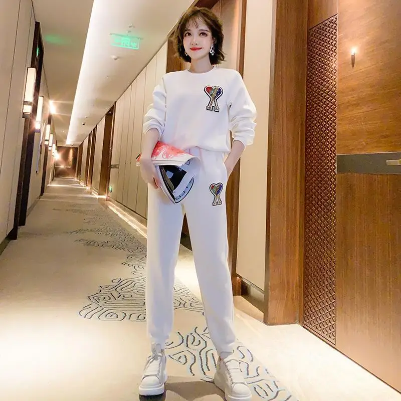 Hot Diamond pattern loose matching sweater + slim leisure bound trouser suit women spring and autumn new 
Hot Diamond pattern loose matching sweater + slim leisure bound trouser suit women spring and autumn new