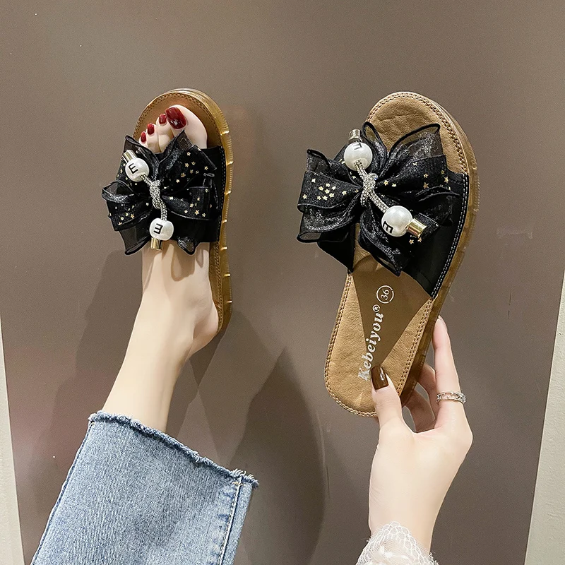 Butterfly-Knot Shoes Woman 2021 Slippers Casual Low String Bead Pantofle Shale Female Beach Luxury Flat New Sabot Patent Leather
Butterfly-Knot Shoes Woman 2021 Slippers Casual Low String Bead Pantofle Shale Female Beach Luxury Flat New Sabot Patent Leather