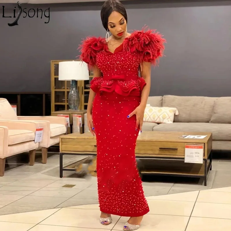 Luxury Beaded African Evening Dresses Pearls Feather Short Sleeves Sheath Black Women Formal Dresses Customize Prom Party Gowns
Luxury Beaded African Evening Dresses Pearls Feather Short Sleeves Sheath Black Women Formal Dresses Customize Prom Party Gowns