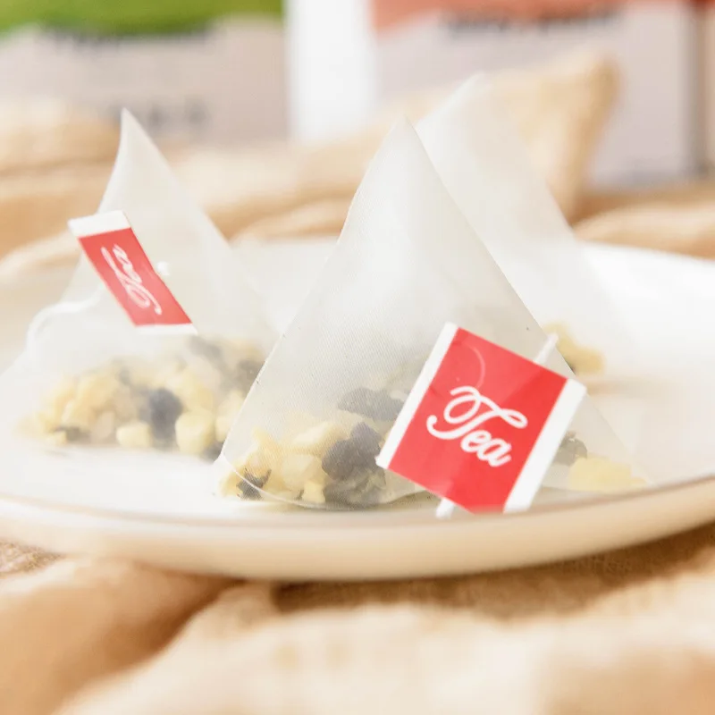 60g Flower time peach oolong tea triangle tea bag white peach oolong fruit tea small bag containing flower tea combination.
60g Flower time peach oolong tea triangle tea bag white peach oolong fruit tea small bag containing flower tea combination.