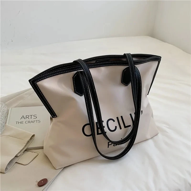 Canvas Tote Bag Women Shopper Designer Handbag 2022 Fashion Casual Large Capacity Solid Color Circular Letter Print Shoulder Bag
Canvas Tote Bag Women Shopper Designer Handbag 2022 Fashion Casual Large Capacity Solid Color Circular Letter Print Shoulder Bag